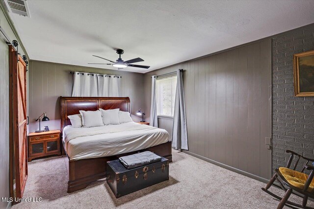 12661 Springridge Rd, Terry, MS 39170 - carpeted bedroom with a ceiling fan and wood walls