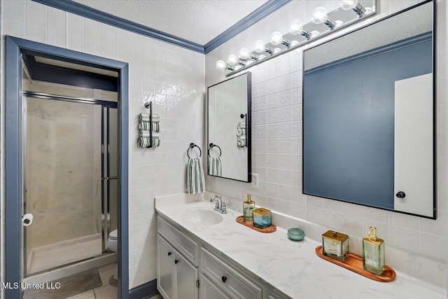 12661 Springridge Rd, Terry, MS 39170 - full bath with vanity, tasteful backsplash, a shower stall, tile walls, and a textured ceiling