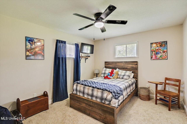 12661 Springridge Rd, Terry, MS 39170 - carpeted bedroom featuring baseboards and a ceiling fan