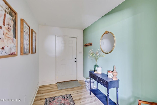 12661 Springridge Rd, Terry, MS 39170 - foyer entrance with light wood-type flooring and baseboards