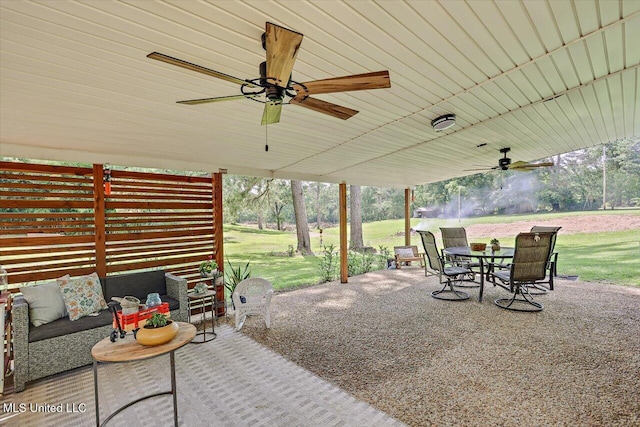 12661 Springridge Rd, Terry, MS 39170 - view of patio with ceiling fan and outdoor dining space