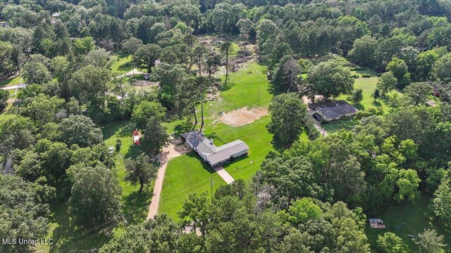 12661 Springridge Rd, Terry, MS 39170 - aerial overview of property's location featuring a heavily wooded area