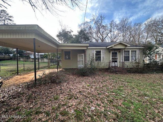 3411 25th Ave, Meridian, MS 39305 - exterior space with a carport and fence