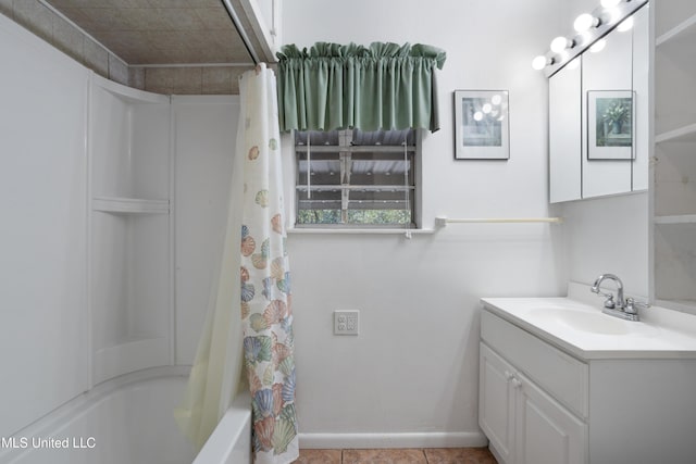 bathroom with tile patterned flooring, vanity, and shower / bath combo with shower curtain