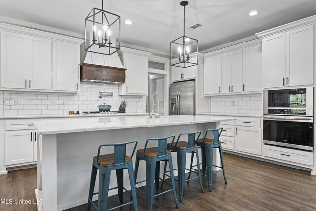 kitchen featuring stainless steel fridge with ice dispenser, dark wood-type flooring, a notable chandelier, and visible vents