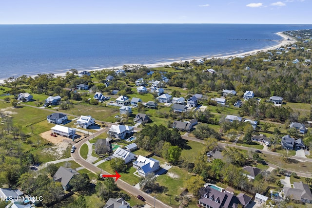 birds eye view of property featuring a water view and a residential view
