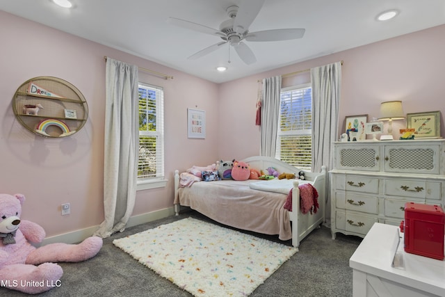 bedroom with baseboards, dark carpet, and recessed lighting