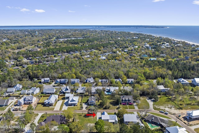 aerial view with a residential view and a water view