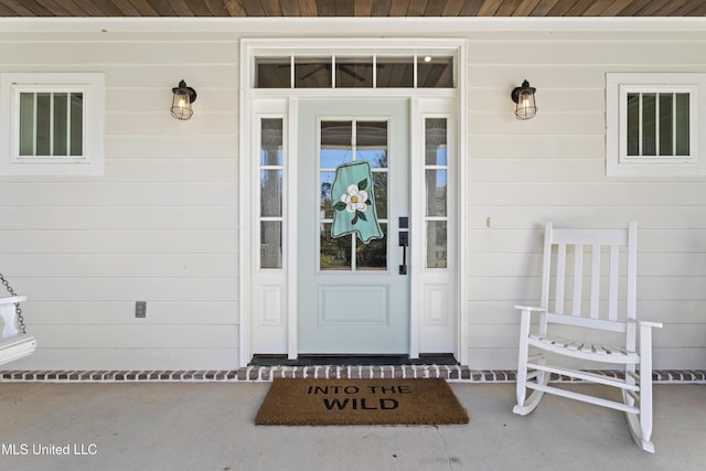 property entrance with a porch