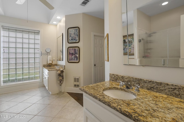 215 Azalea Ct, Brandon, MS 39047 - full bath featuring healthy amount of natural light, two vanities, heating unit, baseboards, and recessed lighting