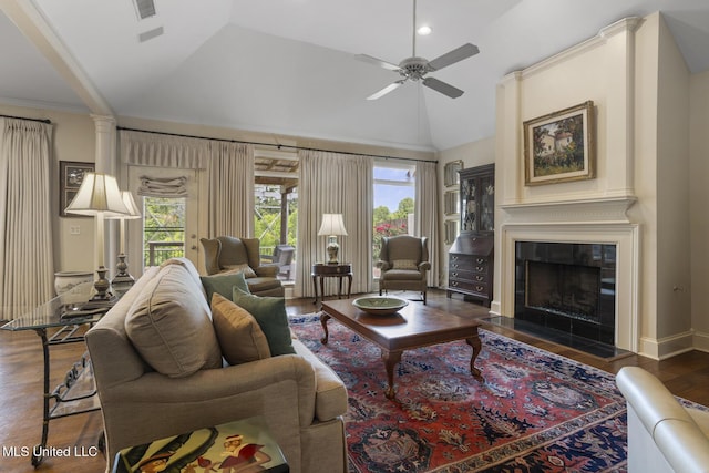 215 Azalea Ct, Brandon, MS 39047 - living area with a ceiling fan, healthy amount of natural light, wood finished floors, a fireplace, and lofted ceiling