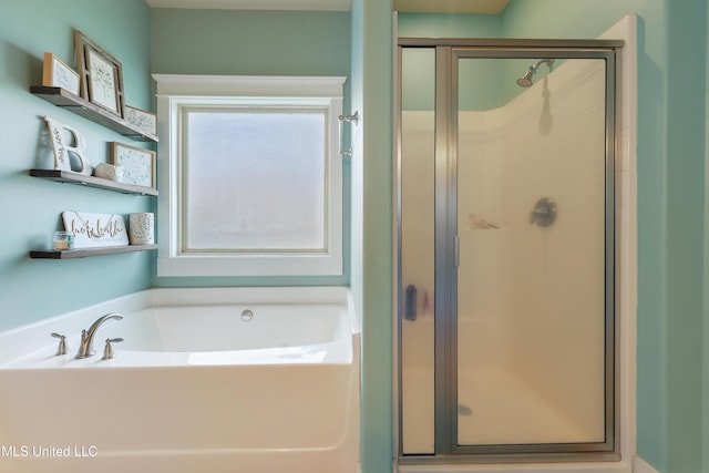 18225 Tulip Cv, Gulfport, MS 39503 - bathroom with a stall shower and a bath