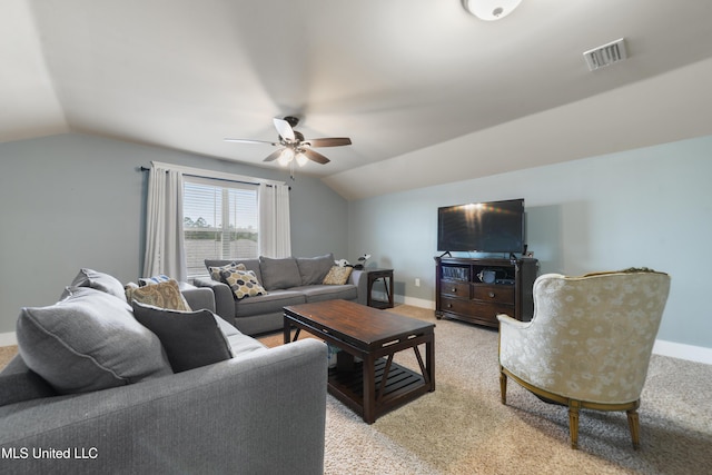 18225 Tulip Cv, Gulfport, MS 39503 - living area featuring vaulted ceiling, a ceiling fan, baseboards, and light colored carpet