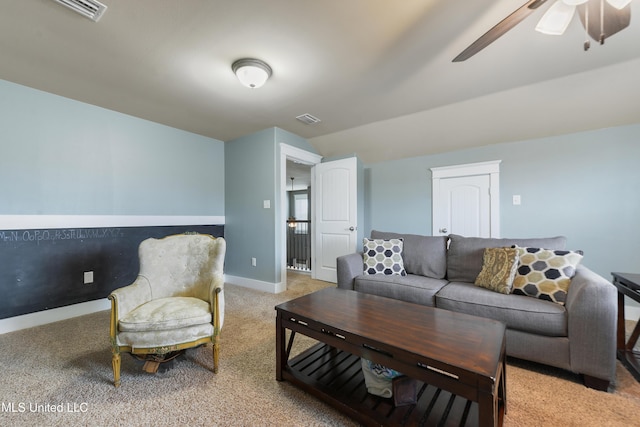 18225 Tulip Cv, Gulfport, MS 39503 - living room with carpet, a ceiling fan, baseboards, and vaulted ceiling