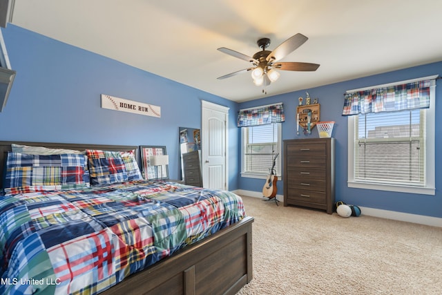 18225 Tulip Cv, Gulfport, MS 39503 - bedroom featuring carpet, baseboards, a ceiling fan, and a closet