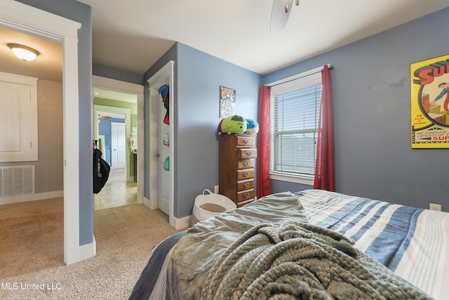 18225 Tulip Cv, Gulfport, MS 39503 - bedroom featuring light carpet and baseboards