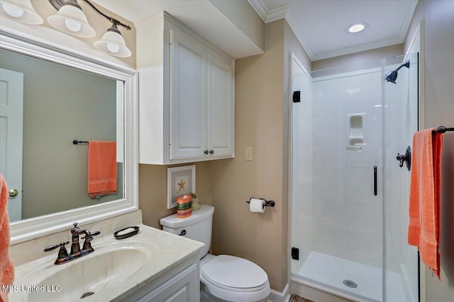 bathroom featuring vanity, ornamental molding, an enclosed shower, and toilet