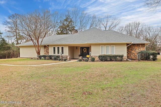 single story home with a front lawn