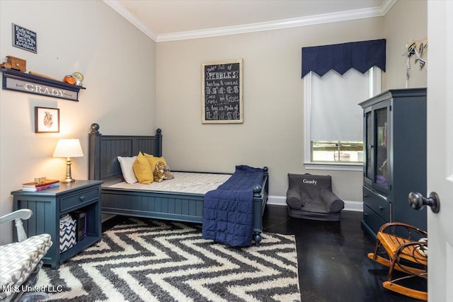 bedroom featuring crown molding, baseboards, and wood finished floors