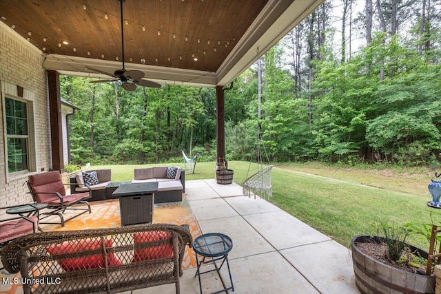 view of patio / terrace featuring ceiling fan and an outdoor living space