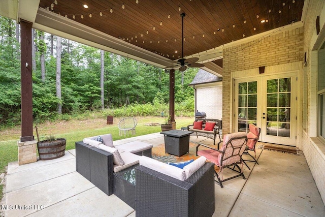 view of patio / terrace featuring ceiling fan, french doors, and an outdoor hangout area