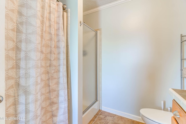 bathroom with a textured ceiling, toilet, walk in shower, vanity, and ornamental molding