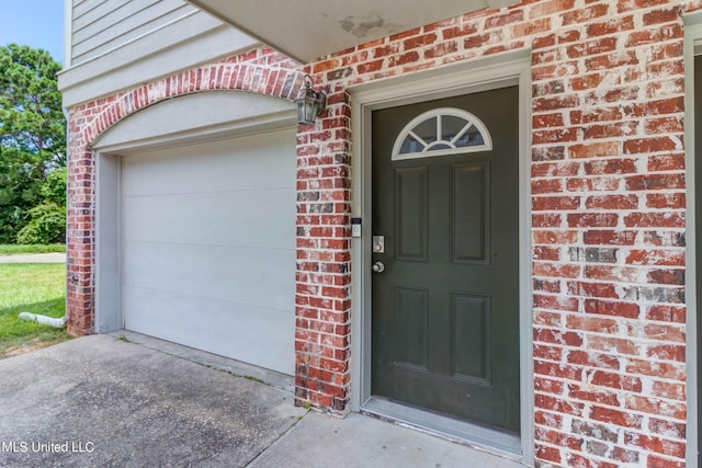 entrance to property with a garage