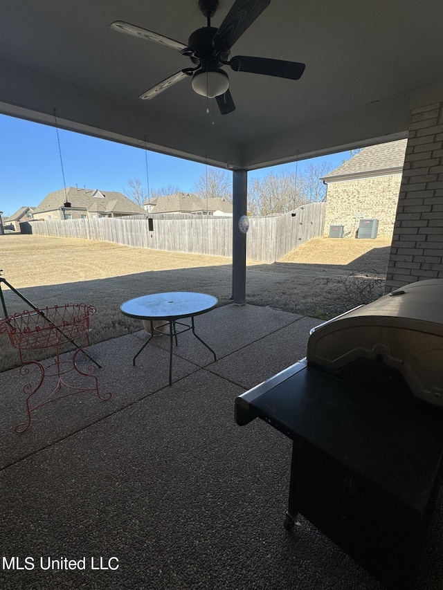 view of patio / terrace featuring ceiling fan and a grill