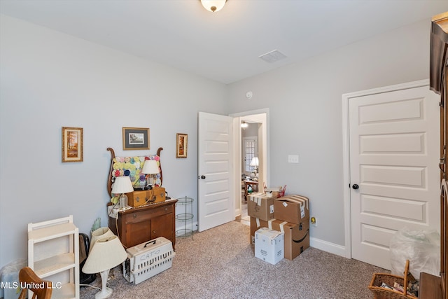 misc room with light colored carpet