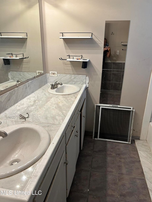 bathroom with vanity and tile patterned floors