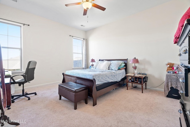 7785 Parkridge Dr, Southaven, MS 38671 - bedroom with light carpet, a desk, baseboards, and a ceiling fan