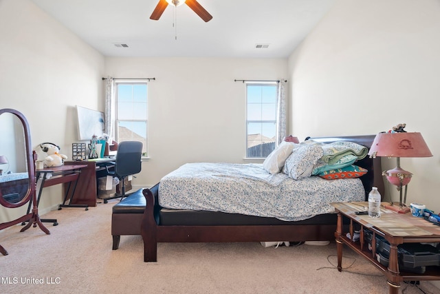 7785 Parkridge Dr, Southaven, MS 38671 - bedroom featuring multiple windows, carpet floors, ceiling fan, and a desk