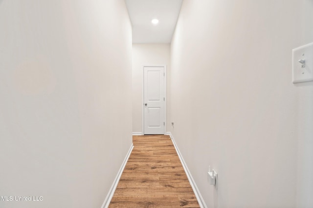 7785 Parkridge Dr, Southaven, MS 38671 - corridor with light wood-style flooring, baseboards, and recessed lighting
