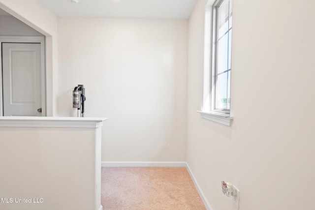 7785 Parkridge Dr, Southaven, MS 38671 - hallway featuring carpet floors and baseboards