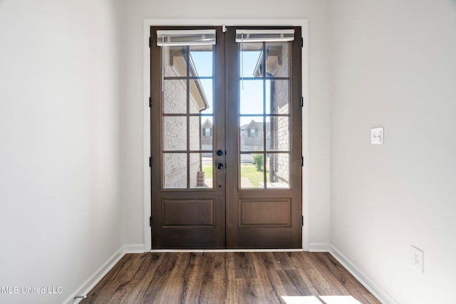 7785 Parkridge Dr, Southaven, MS 38671 - entryway with french doors, dark wood-style floors, and baseboards