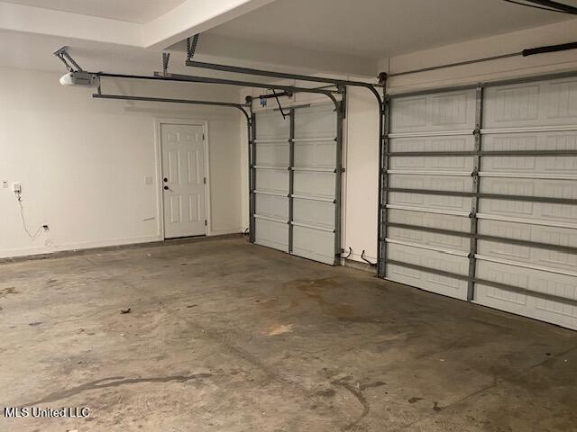 garage with a garage door opener