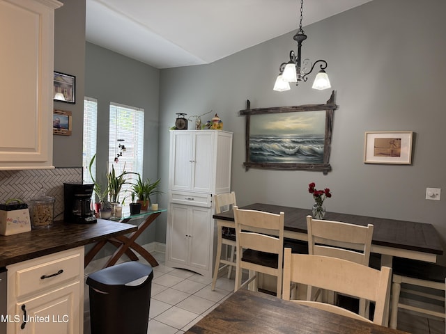 9958 Kahana St, Diamondhead, MS 39525 - office area featuring light tile patterned floors and a chandelier