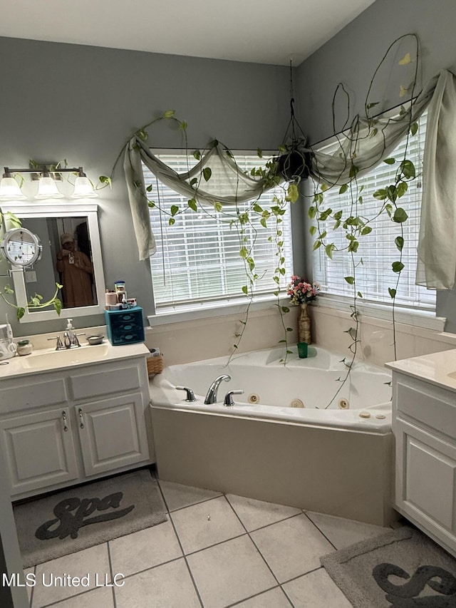 9958 Kahana St, Diamondhead, MS 39525 - full bathroom featuring vanity, a whirlpool tub, and healthy amount of natural light