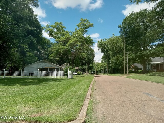207 W Percy St, Indianola, MS 38751 - view of asphalt street with curbs and street lighting