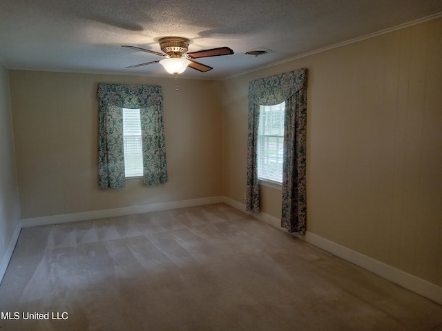 207 W Percy St, Indianola, MS 38751 - unfurnished room with light colored carpet, ceiling fan, ornamental molding, a textured ceiling, and baseboards