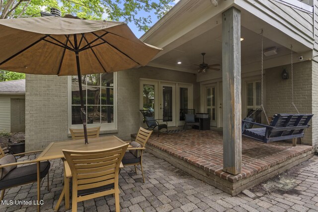 435 Glenway Dr, Jackson, MS 39216 - view of patio / terrace with french doors, a ceiling fan, and outdoor dining space