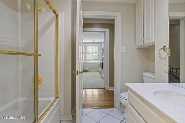 435 Glenway Dr, Jackson, MS 39216 - bathroom with vanity, toilet, baseboards, tile patterned floors, and enclosed tub / shower combo