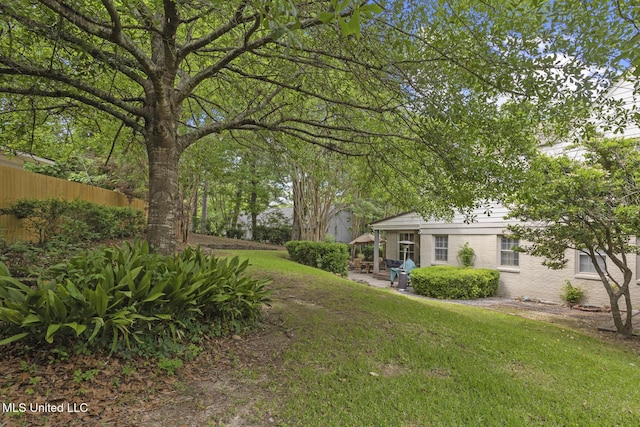 435 Glenway Dr, Jackson, MS 39216 - view of yard featuring fence and a patio