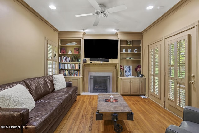 435 Glenway Dr, Jackson, MS 39216 - living room featuring crown molding, a fireplace with flush hearth, and a healthy amount of sunlight