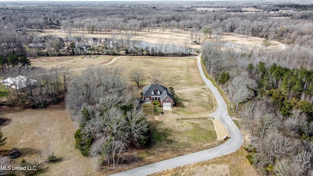 birds eye view of property with a rural view