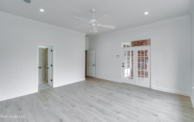 unfurnished room with ornamental molding, ceiling fan, and light wood-type flooring