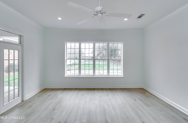 empty room featuring ornamental molding, ceiling fan, and light hardwood / wood-style flooring