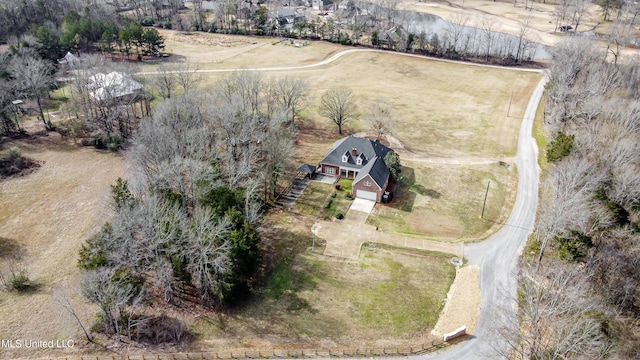 birds eye view of property with a rural view