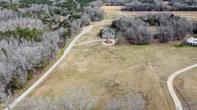 birds eye view of property featuring a rural view