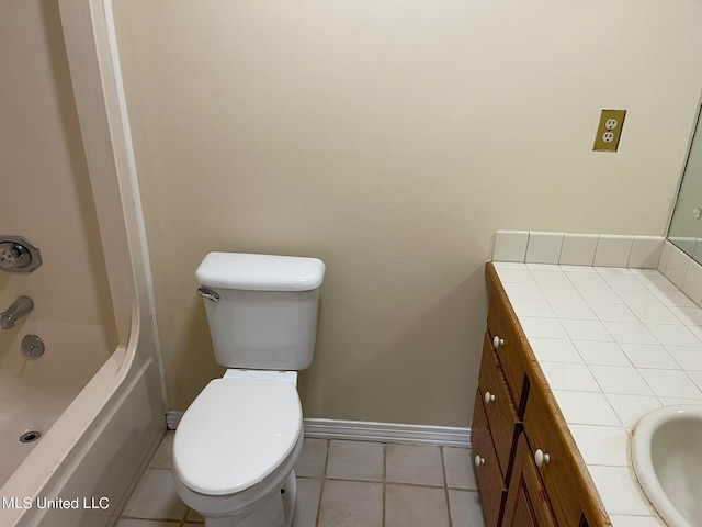 full bathroom with bathtub / shower combination, vanity, toilet, and tile patterned floors